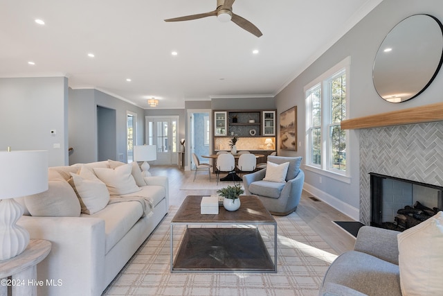 3617 Barnesmore Dr, Castle Hayne, NC 28429 - living room with crown molding, recessed lighting, a ceiling fan, light wood-style floors, and baseboards