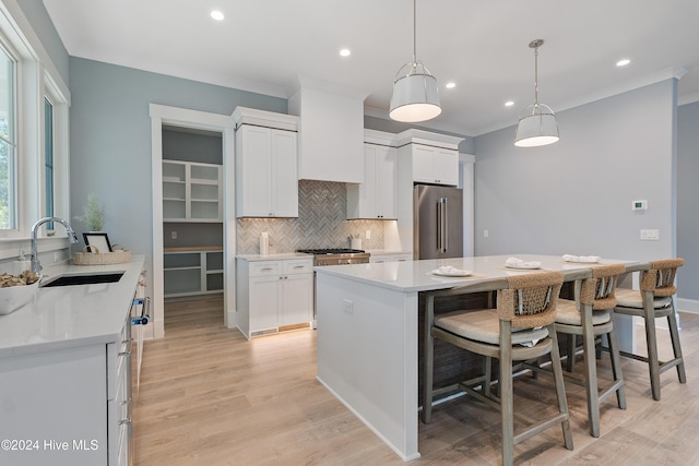 3617 Barnesmore Dr, Castle Hayne, NC 28429 - kitchen featuring high end refrigerator, a sink, tasteful backsplash, a center island, and recessed lighting