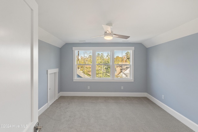 3617 Barnesmore Dr, Castle Hayne, NC 28429 - empty room with vaulted ceiling, light carpet, ceiling fan, and baseboards