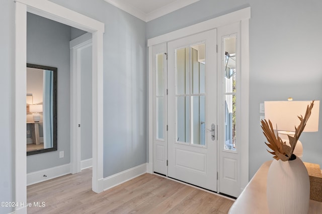 3617 Barnesmore Dr, Castle Hayne, NC 28429 - foyer entrance featuring light wood-style floors, ornamental molding, and baseboards