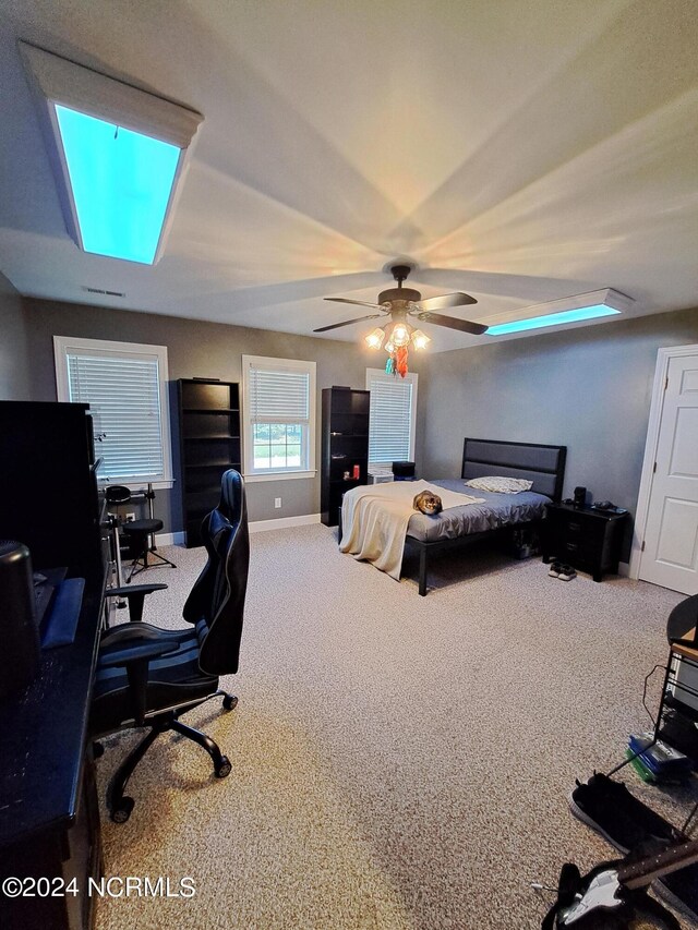 carpeted bedroom with ceiling fan