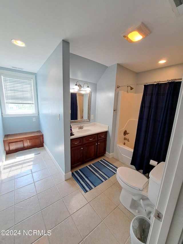 full bath with vanity, toilet, shower / bath combo with shower curtain, and tile patterned floors