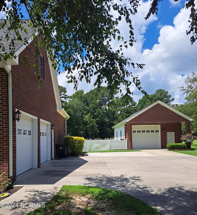 view of property exterior with a garage