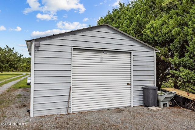 view of outdoor structure featuring a garage