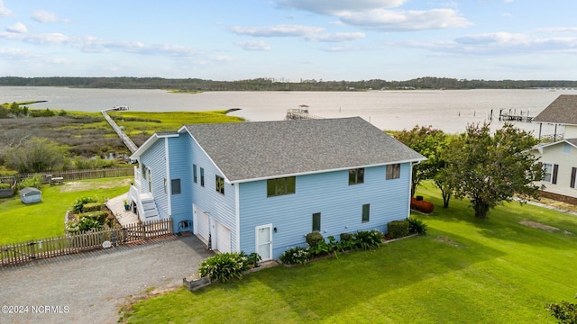 bird's eye view with a water view