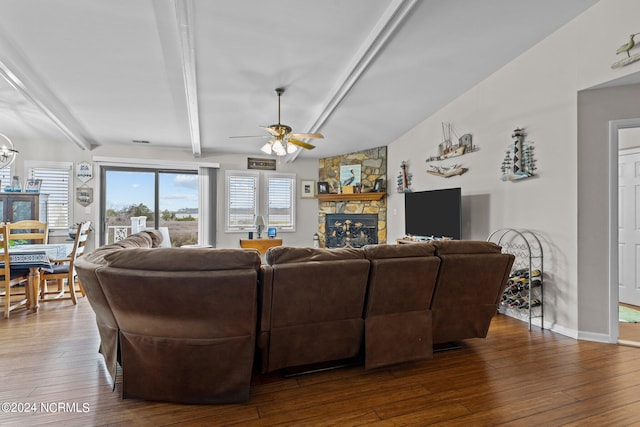 living room featuring ceiling fan, lofted ceiling with beams, a fireplace, and dark hardwood / wood-style floors