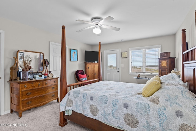 bedroom with ceiling fan and light colored carpet