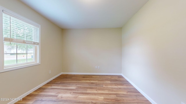 empty room with light wood-type flooring