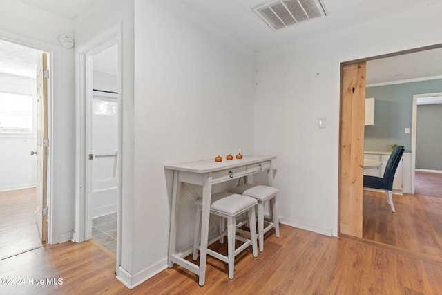 dining room with light wood-type flooring