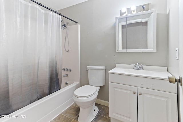 full bathroom with tile patterned floors, vanity, shower / bath combo, and toilet