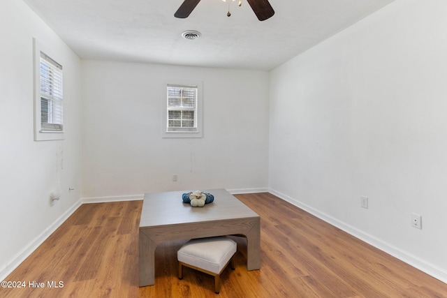 dining room featuring hardwood / wood-style flooring and ceiling fan