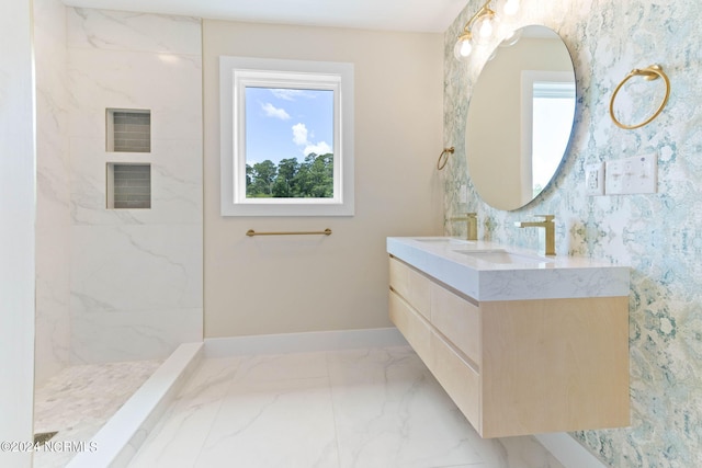 bathroom with vanity and walk in shower