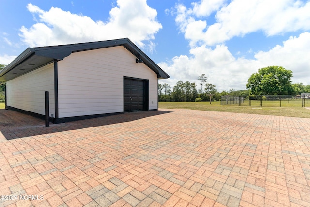 exterior space with a garage