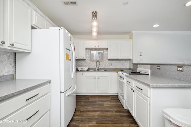 kitchen with ornamental molding, white appliances, dark wood-type flooring, sink, and white cabinetry