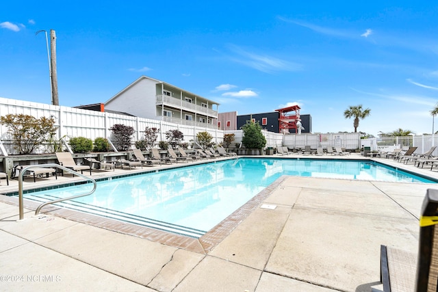 view of pool featuring a patio