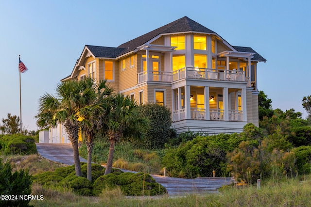 rear view of house with a balcony