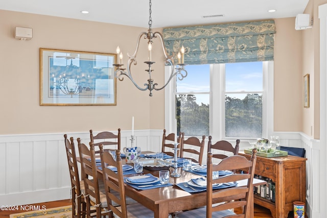 dining room with a chandelier