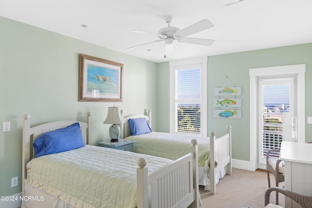 bedroom with light colored carpet and ceiling fan