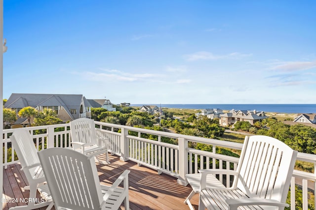 deck featuring a water view