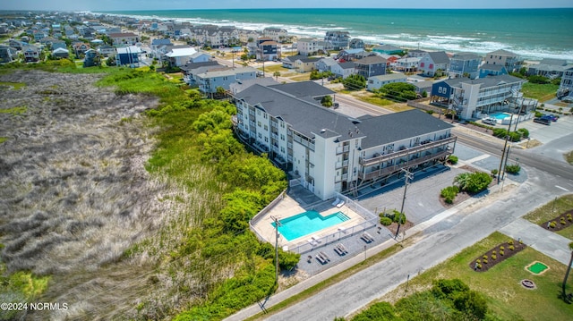 aerial view featuring a water view and a residential view