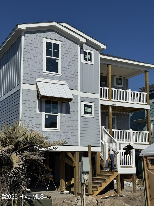 view of front of home with a balcony