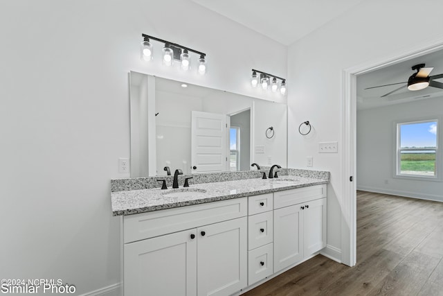 bathroom featuring vanity, ceiling fan, and hardwood / wood-style flooring