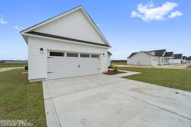 view of side of property featuring a yard