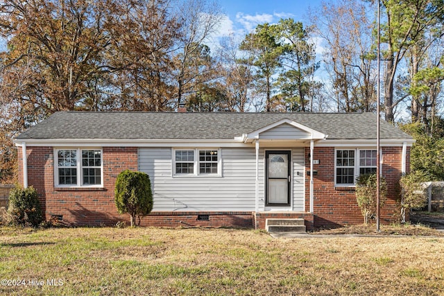 view of front of home featuring a front lawn