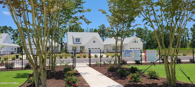 view of home's community featuring a lawn