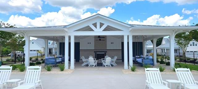 view of patio featuring ceiling fan