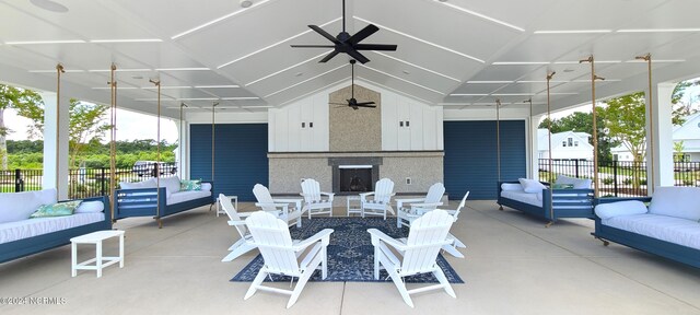 view of patio / terrace with an outdoor living space and ceiling fan