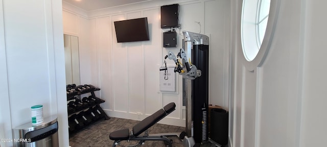 exercise room featuring dark wood-type flooring