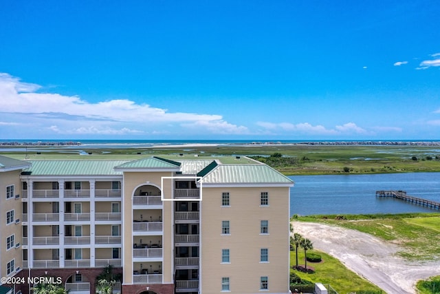 view of building exterior with a water view