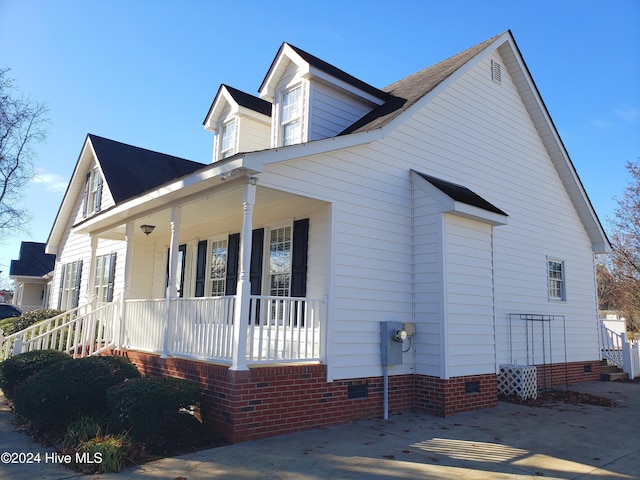 view of home's exterior featuring a porch