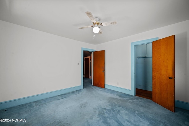 unfurnished bedroom with ceiling fan, a closet, and carpet flooring