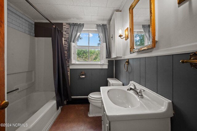 full bathroom featuring toilet, vanity, and shower / bath combo