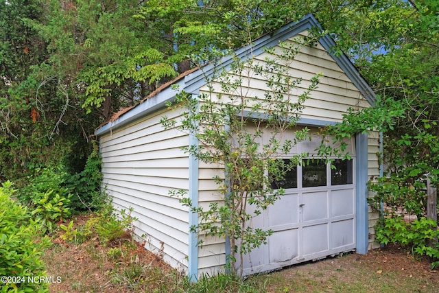 view of outdoor structure with a garage