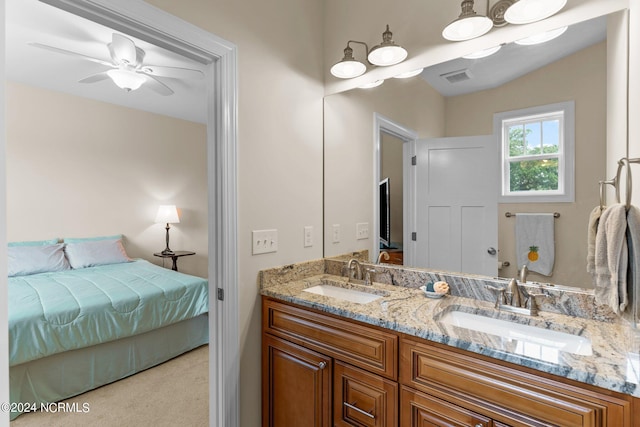 bathroom featuring vanity and ceiling fan