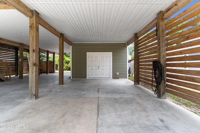 view of patio featuring a carport