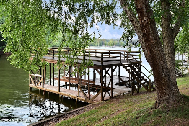 dock area featuring a water view