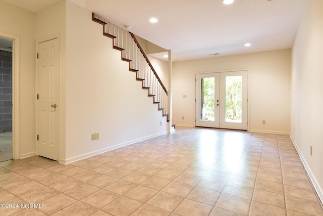 entryway with baseboards, stairway, french doors, and recessed lighting