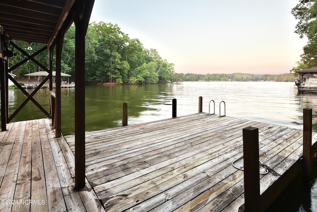 dock area featuring a water view