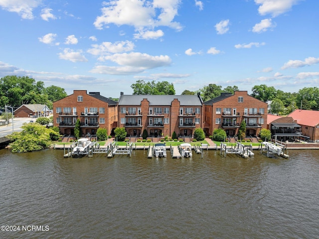 view of water feature with a dock