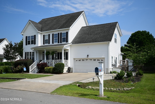 colonial home with a front yard and covered porch