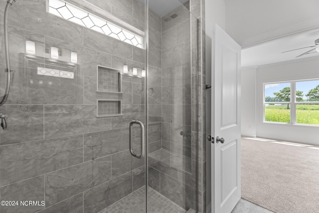 full bath featuring a shower stall and ceiling fan