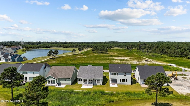 aerial view with a residential view and a water view