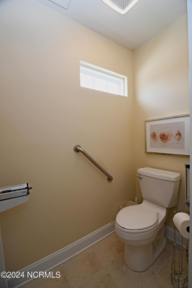 bathroom featuring toilet