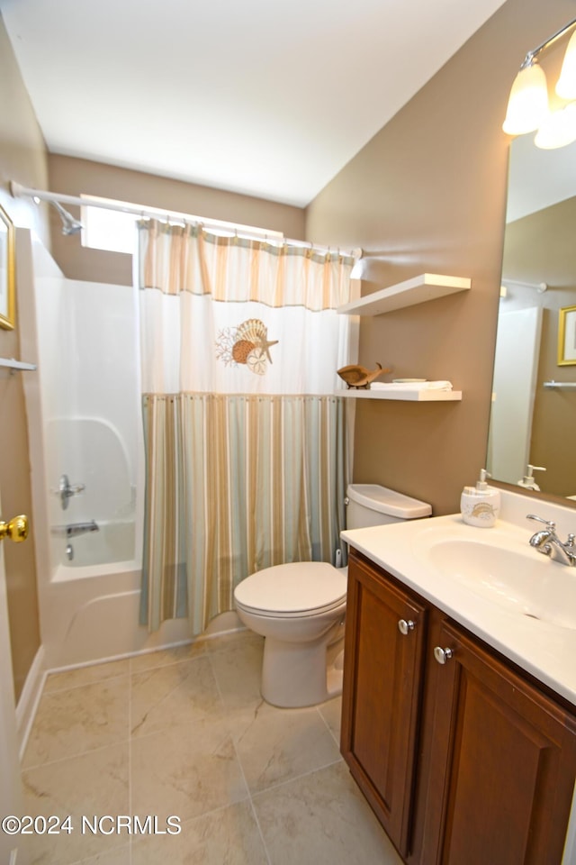 full bathroom featuring tile patterned flooring, shower / tub combo, vanity, and toilet