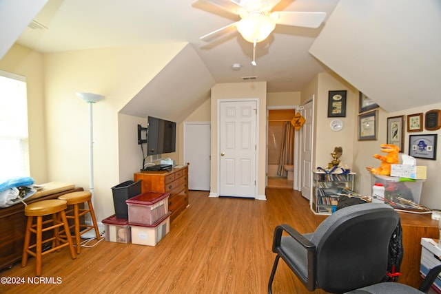 home office featuring ceiling fan and light hardwood / wood-style floors