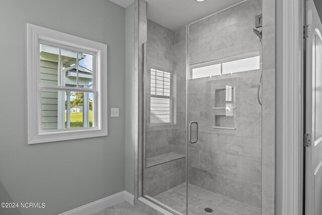 bathroom with an enclosed shower